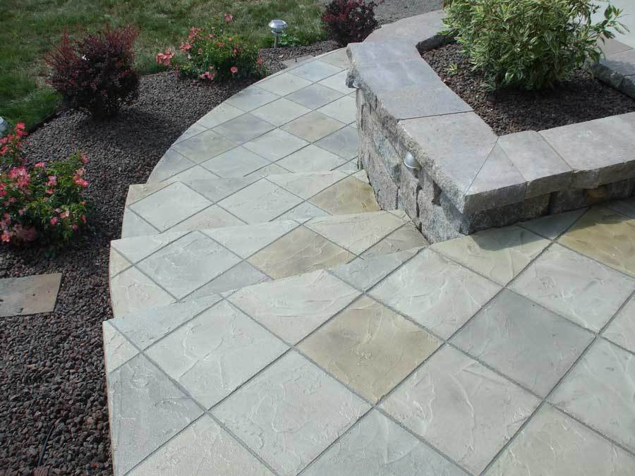 Artistic textured concrete finish with custom hand-finishing