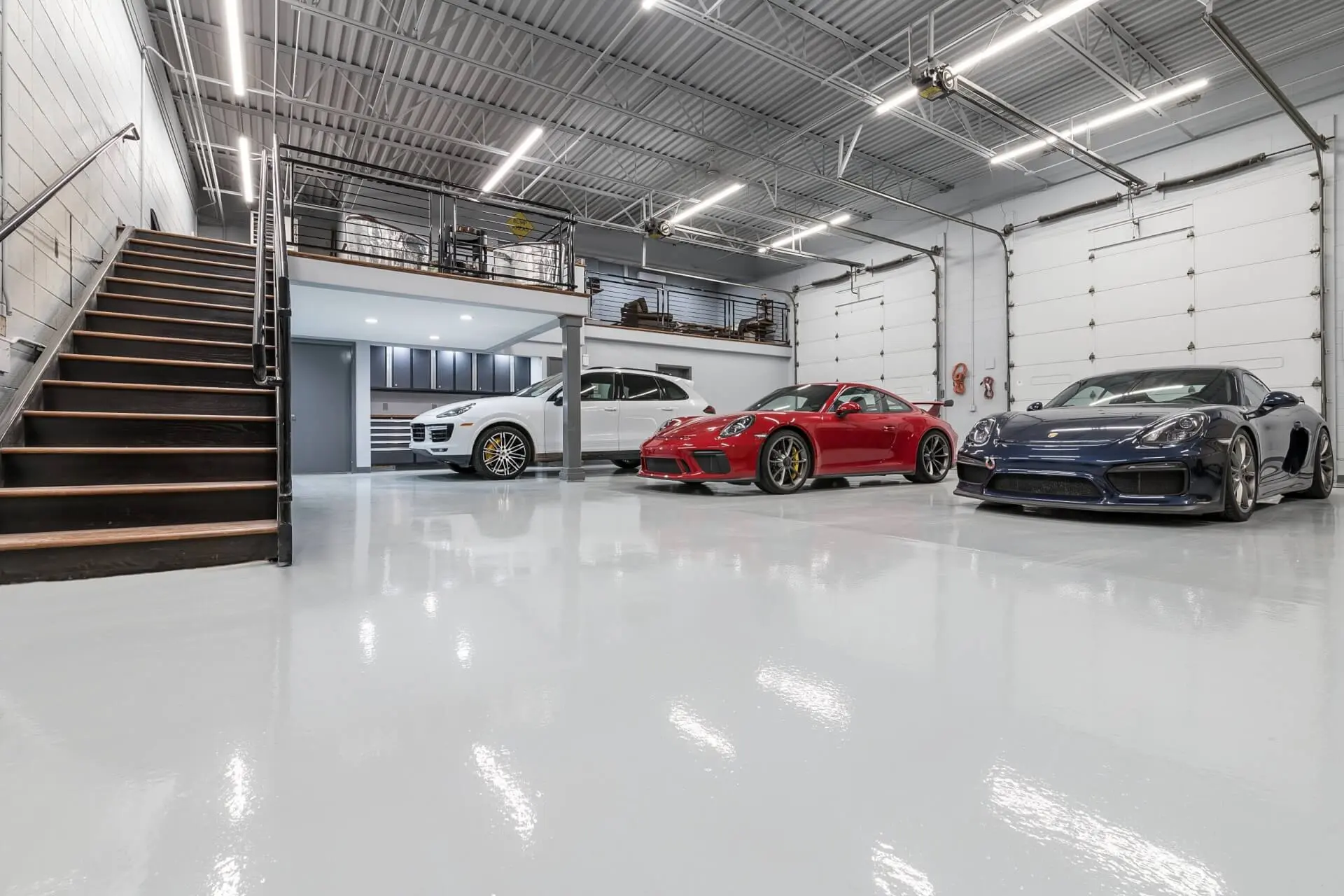 Professional automotive facility flooring with specialized coating